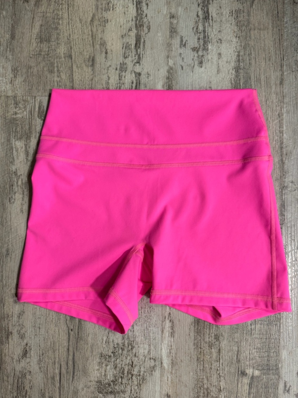 Fleo Women's High Rise Shorts in Neon Pink No Front Seam Medium